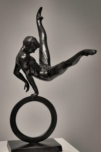 Black and white image of a statue of a gymnast taken by MrPKalu