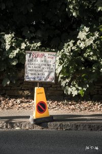Placard abandoned in Woodstock during President Trump's visit