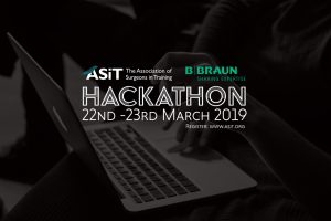 ASiT Hackathon promotional image showing a delegate working on an Apple laptop