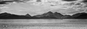 Black and white image of a sailing boat near the Isle of Skye in Scotland captured by MrPKalu