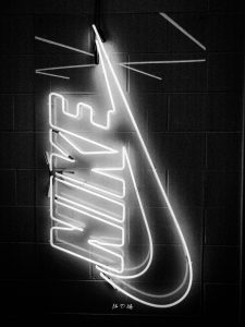 Black and white image of Nike logo in niketown chicago